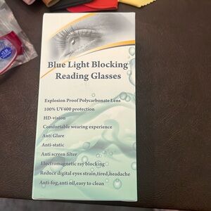 Set of 4 blue light blocking glasses with 3.5 magnification. New in package